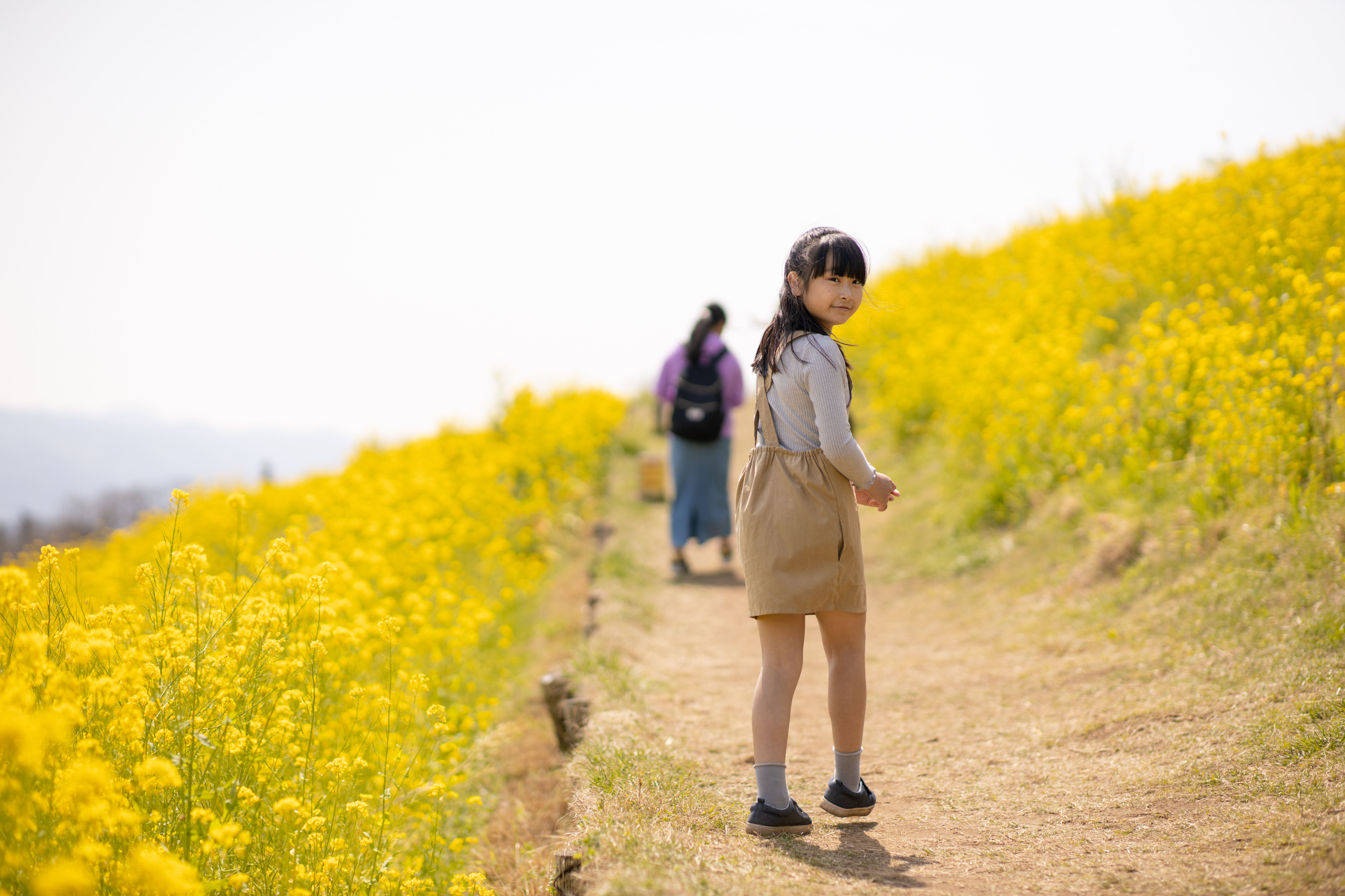 Young girl on wildflower trail