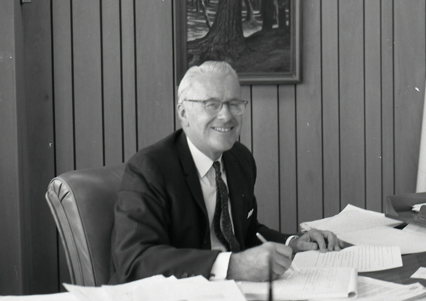 William Penn Mott, Jr at desk