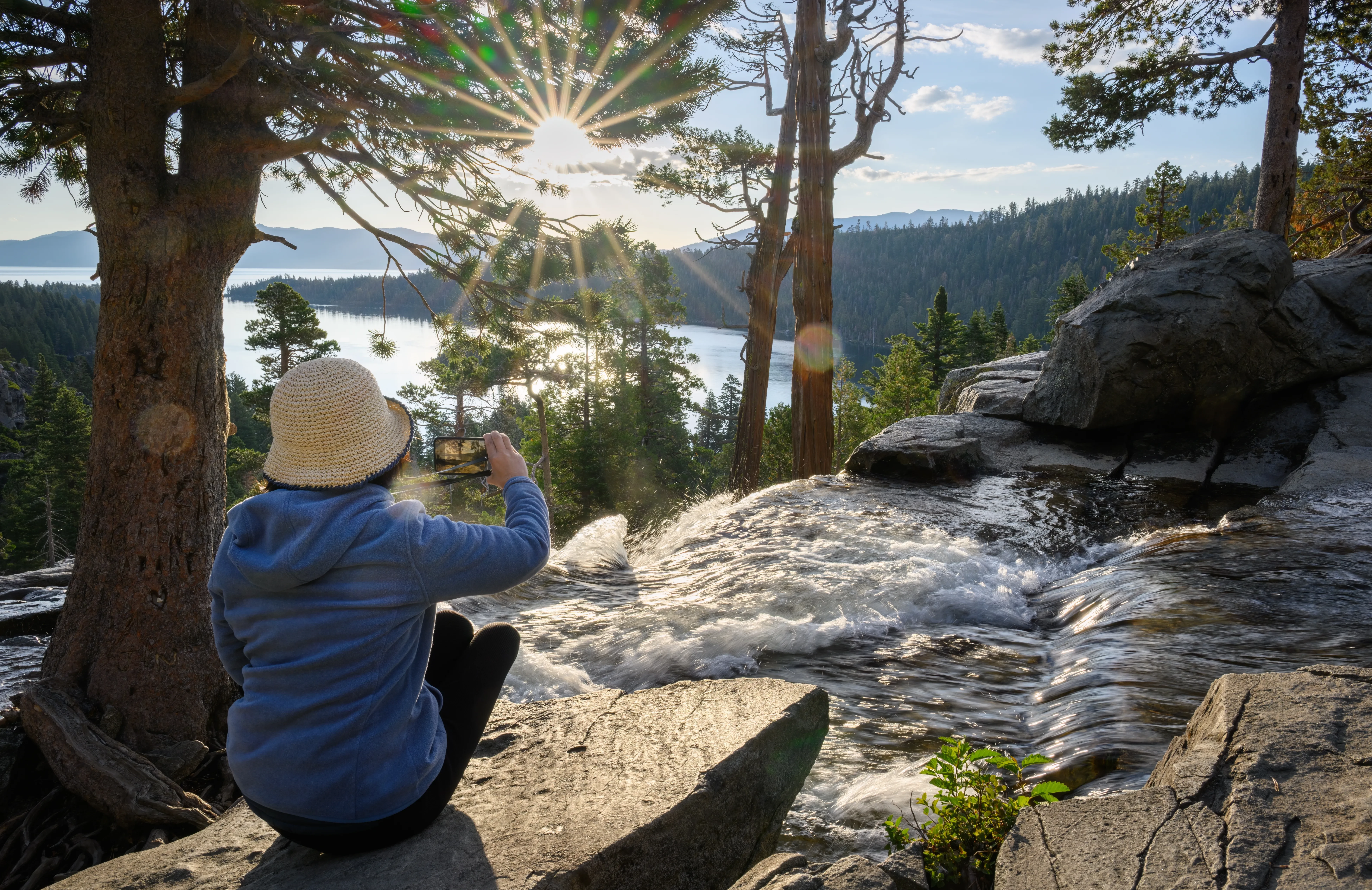 Woman taking photo at Emerald Bay State Park
