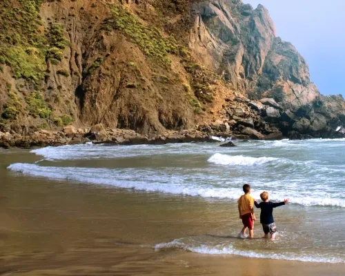 Two youth on beach