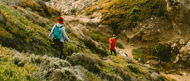 Two people hiking Garrapata State Park