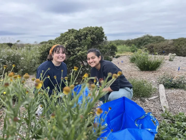 Two volunteers at Half Moon Bay State Beach