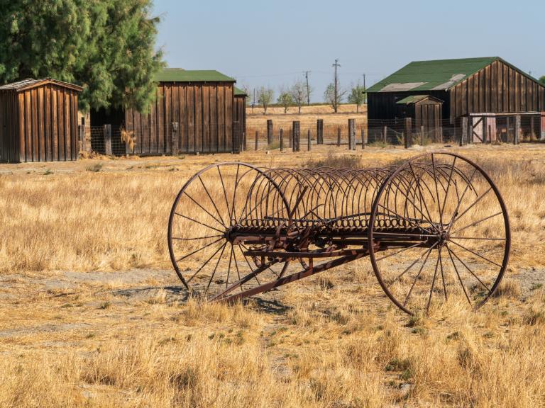 Old farm equipment at Colonel Allensworth State Historic Park