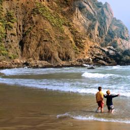 Two youth on beach