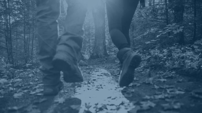 Hiking feet with a blue tone overlay 