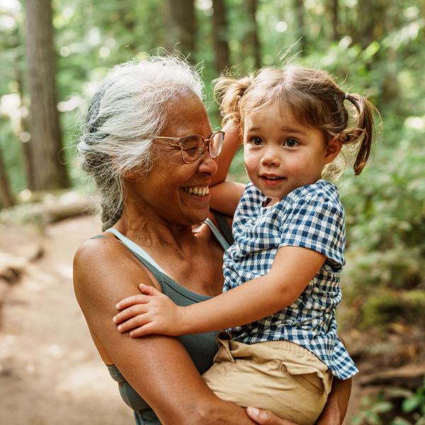 Older woman with female child on a trail